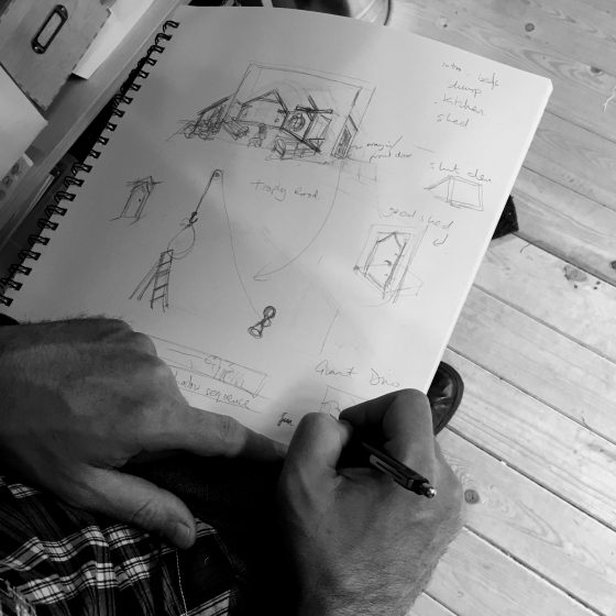 Mark sketches a storyboard for The Dinosaur That Came For Christmas