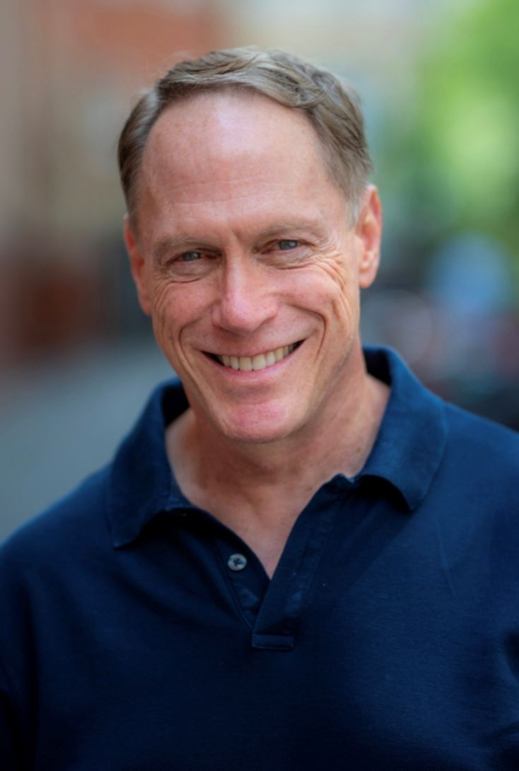 Television actor, Todd Boyce. A man with short brown hair wearing a navy blue polo shirt.