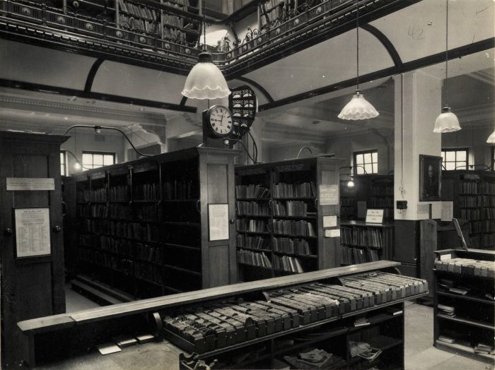 1949 inside lending library, classic book shelfs and photo taken in black and white  