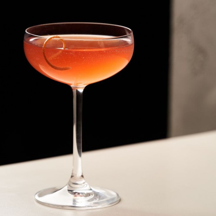 Cocktail in glass on table