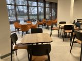 Cafe seating area inside Derby Racecourse Hub