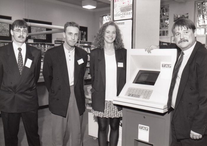 training and access point machine set up and 3 men and 1 women